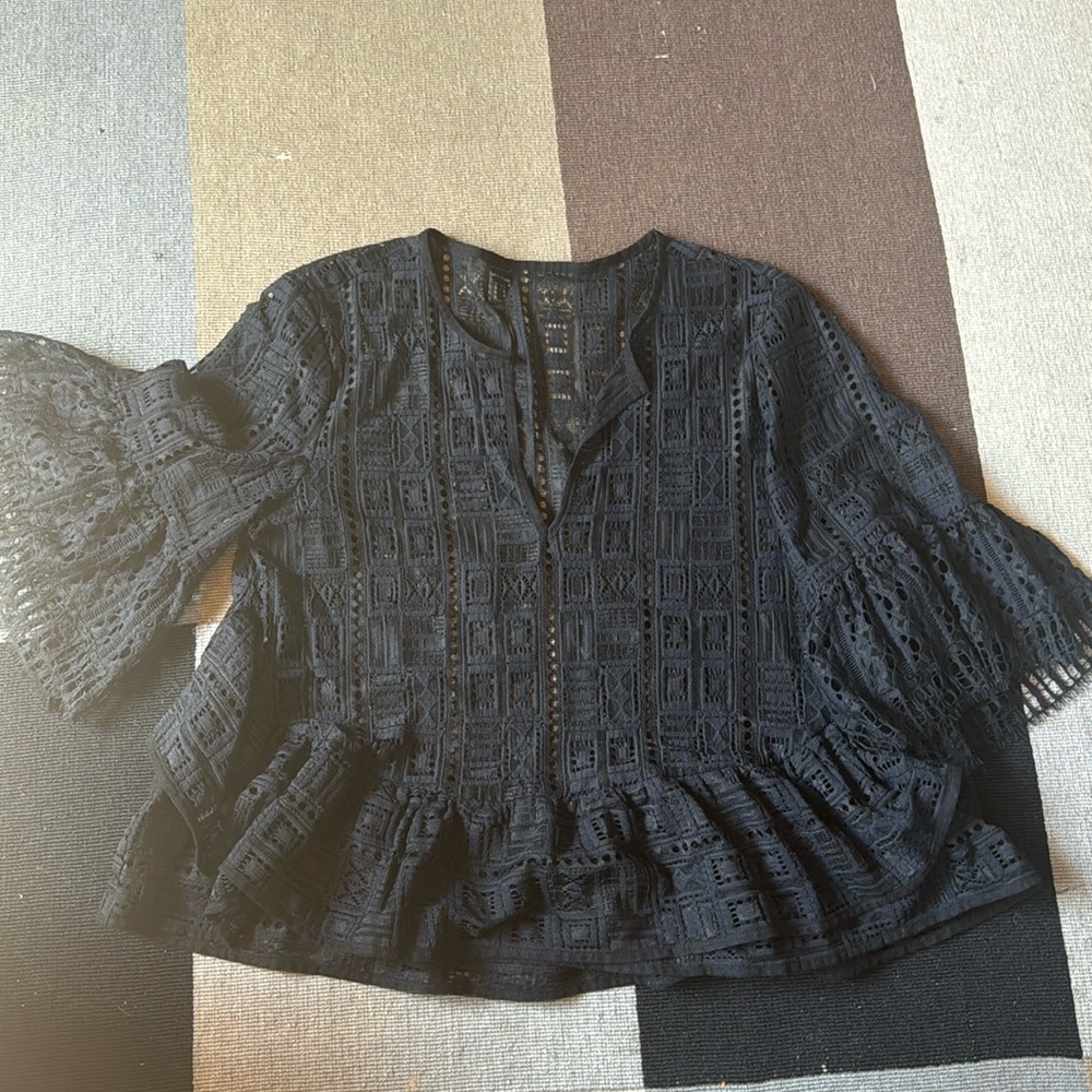 BCBG Maxazria Immate Geometric Cutout Peplum Top in Black, size M